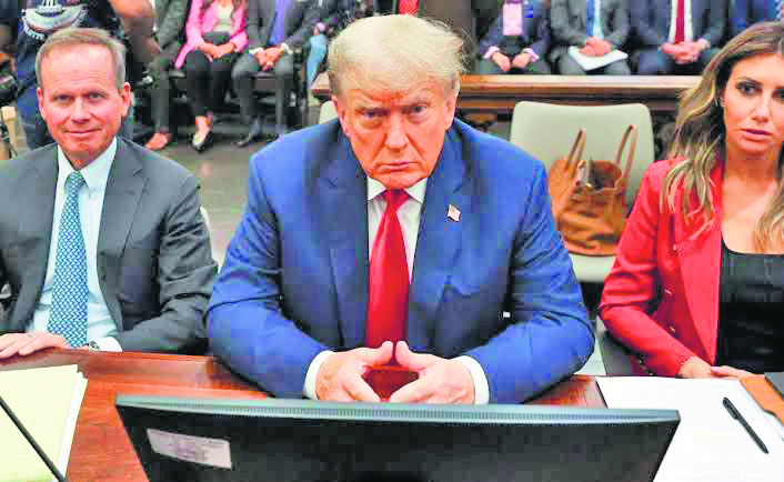 Trump embraces Jan 6 rioters as patriots during court trial