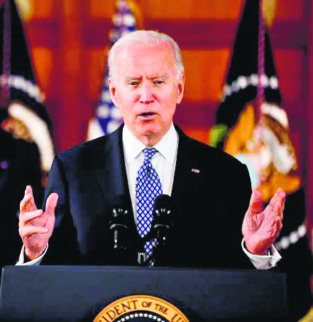 President Joe Biden signs temporary spending bill