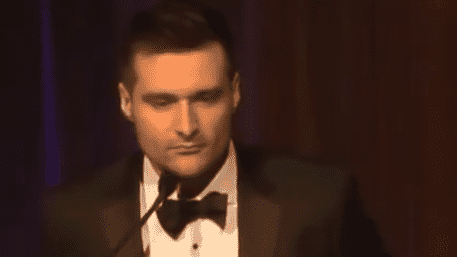 Alex Bruesewitz, Trump Adviser, Collapses On-Stage During Speech At NYC Gala | WATCH