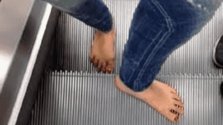‘May Get Electric Shock’: Woman Left Barefoot On Escalator After Slipper Stolen By Prankster | WATCH