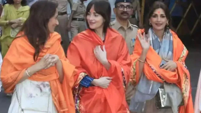 Dakota Johnson Enjoys Mumbai Visit with Coldplay’s Chris Martin, Poses with Bollywood Stars