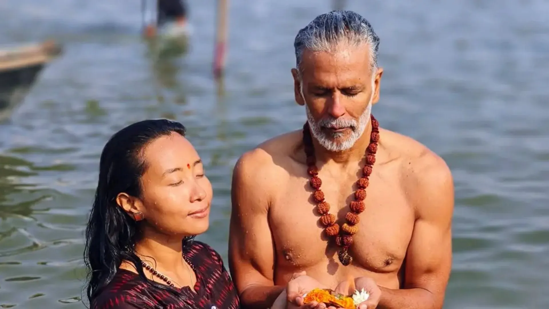 Milind Soman and Ankita Konwar Participate in Holy Dip at Maha Kumbh 2025