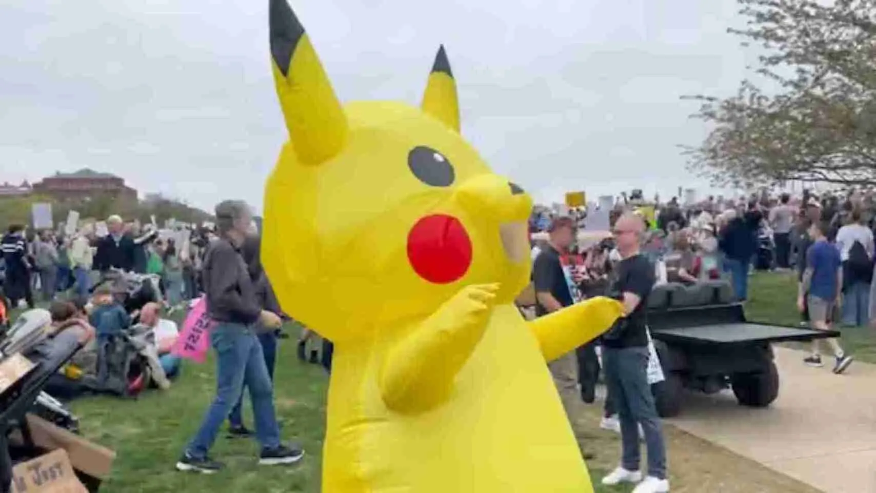 Not Just A Cartoon: ‘Pikachu’ Joins ‘Hands Off’ Protests In Washington Against Trump | WATCH