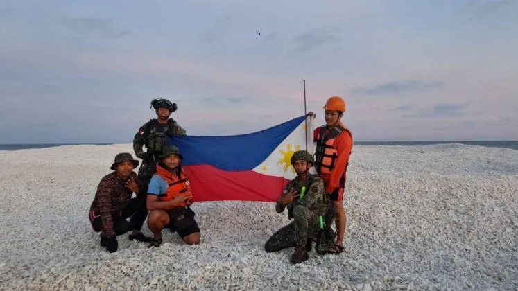 Philippines Plants Flag at Disputed Sandy Cay Reef, Challenging China’s Claim