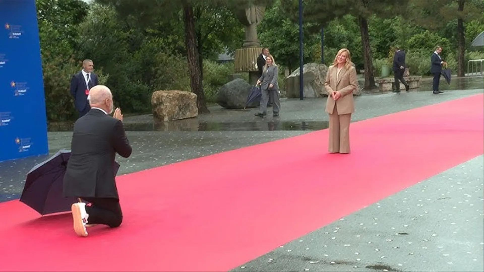 Albanian PM Edi Rama Kneels to Greet Italian PM Giorgia Meloni at EU Summit | Watch