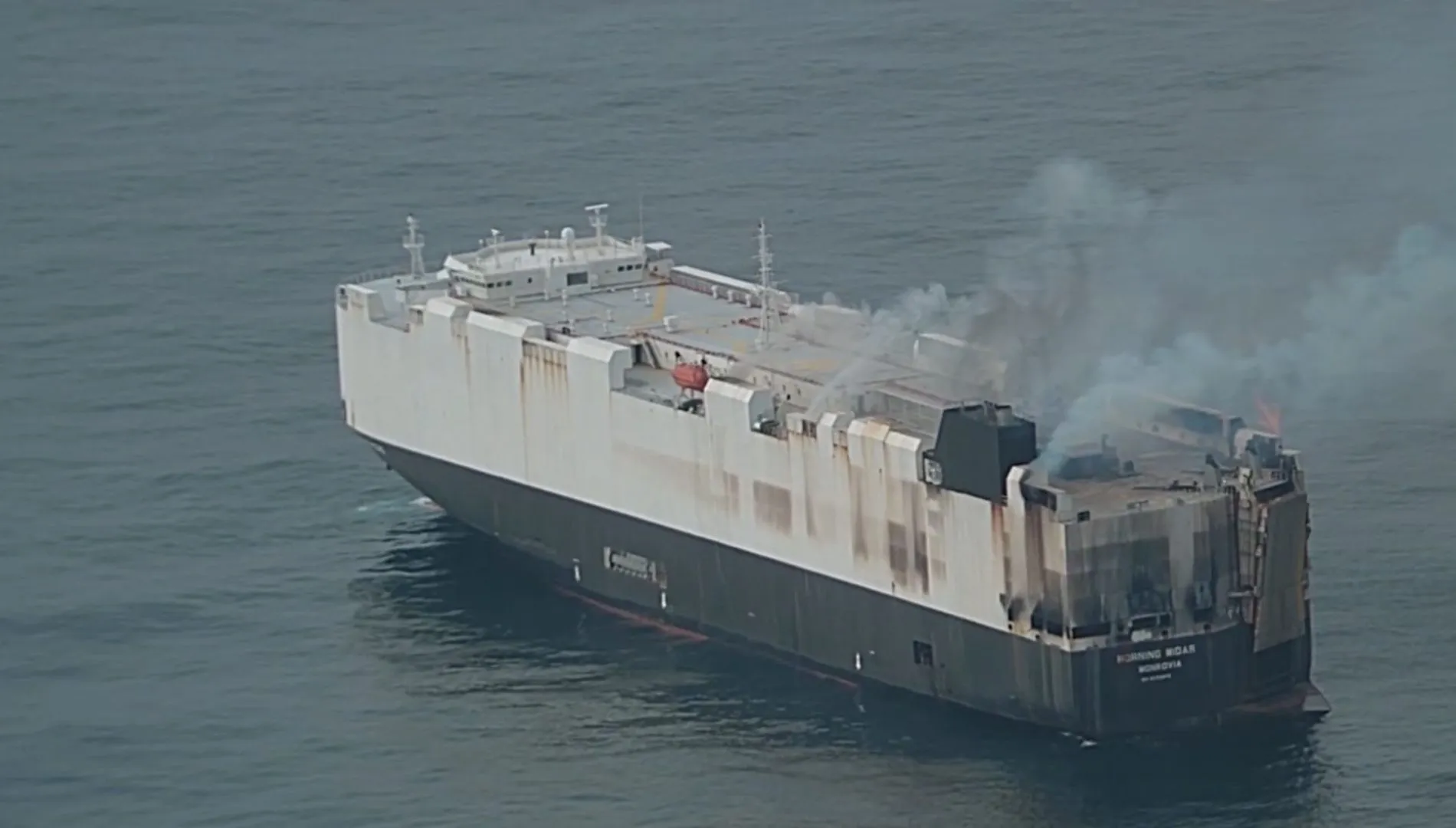 Cargo Ship Sinks in Pacific with 3,000 Vehicles After Weeks of Fire & Storms | Watch