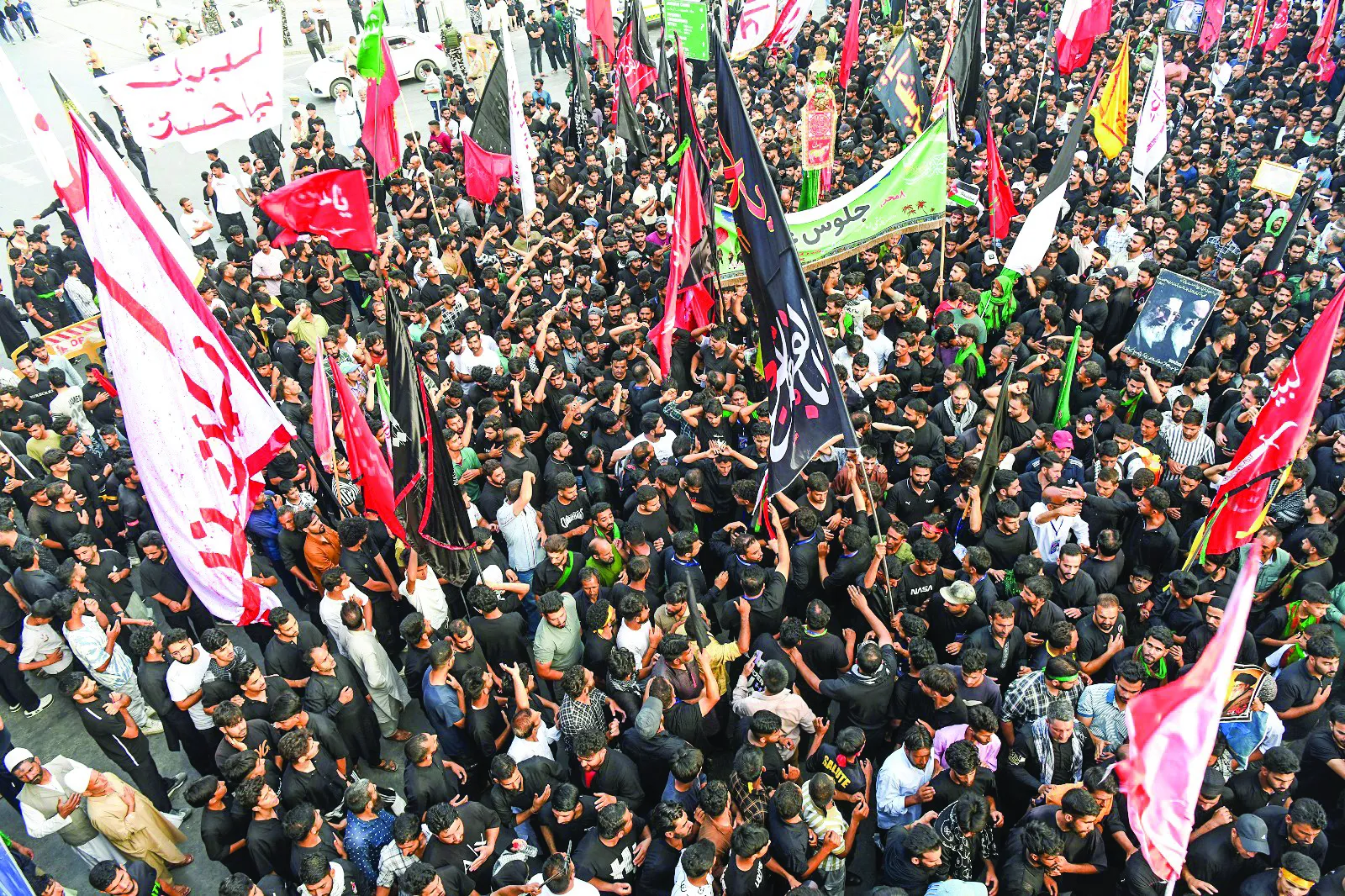 Flags of Iran, Palestine raised in Muharram procession in Srinagar