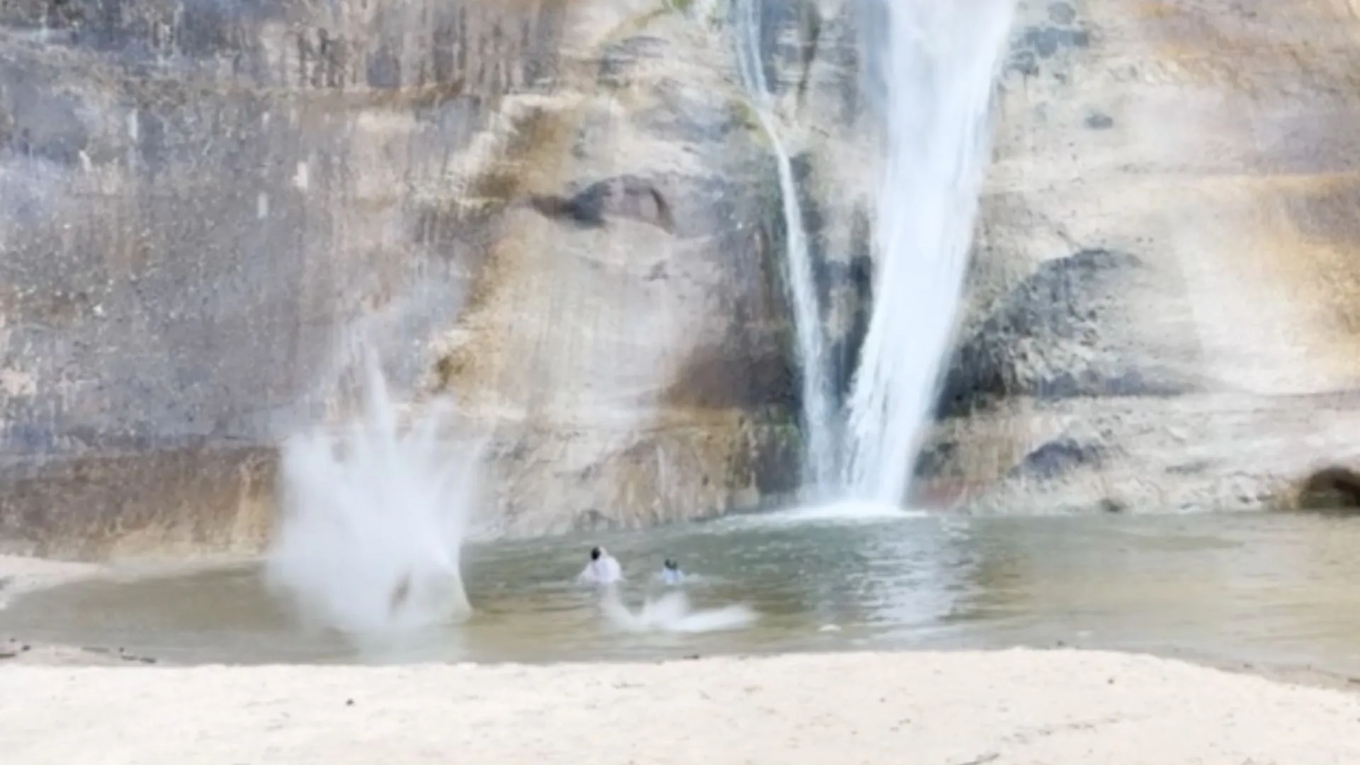 PURE LUCK: Swimmers Narrowly Escape Falling Boulders at Utah Waterfall | WATCH